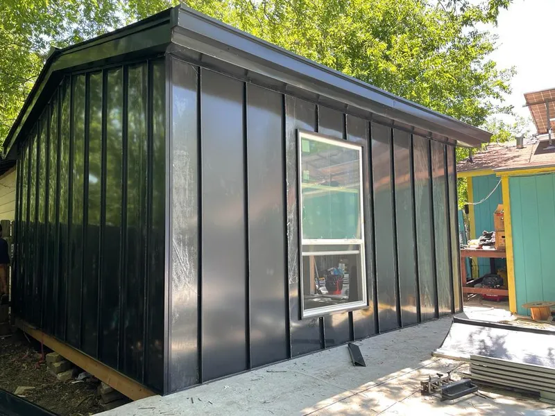 Black standing seam metal wall panels for Roof Inspection in Nipomo